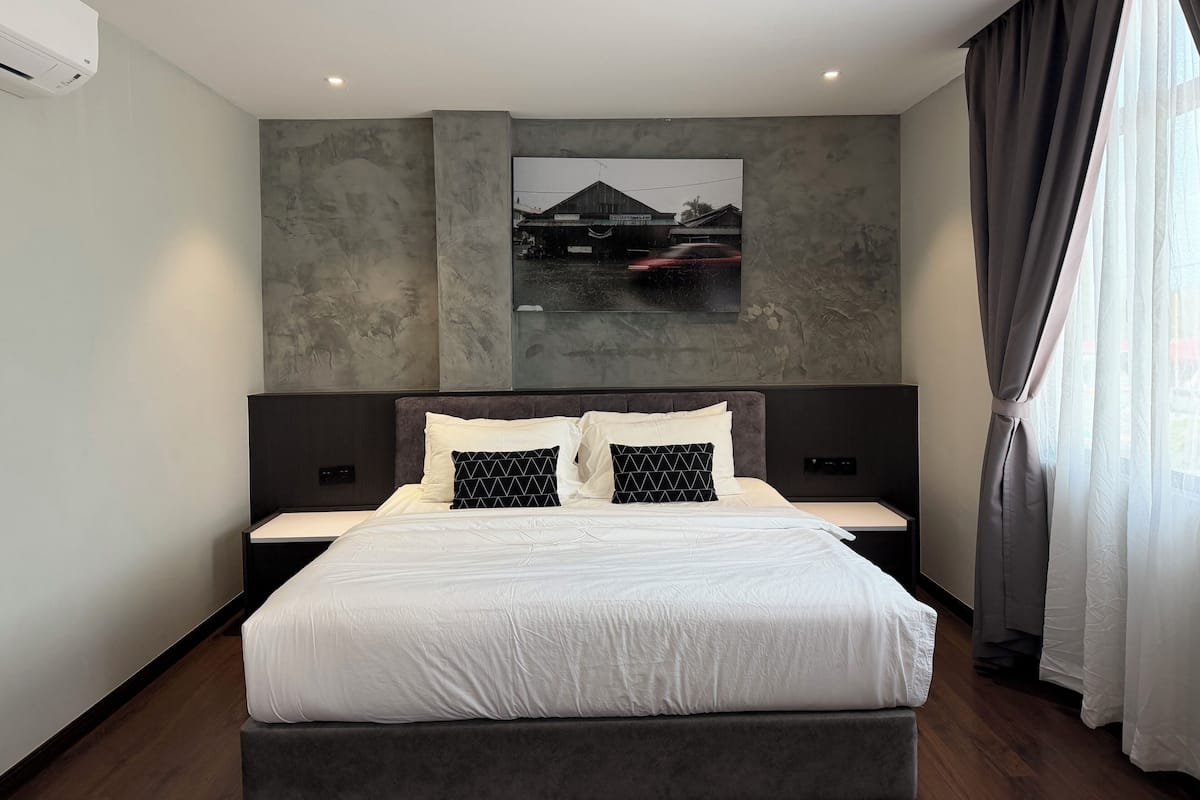 Deluxe King | Minibar, coffre-fort, rideaux dâobscurcissement