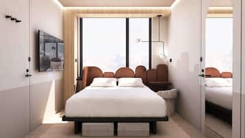 Hypo-allergenic bedding, in-room safe, laptop workspace