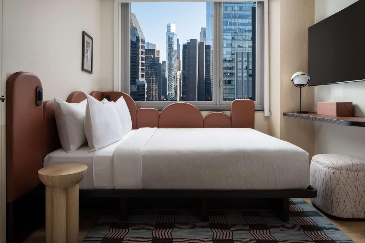 Hypo-allergenic bedding, in-room safe, laptop workspace, blackout drapes