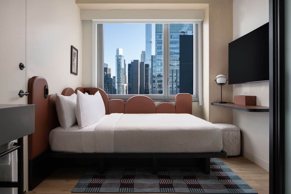 Hypo-allergenic bedding, in-room safe, laptop workspace