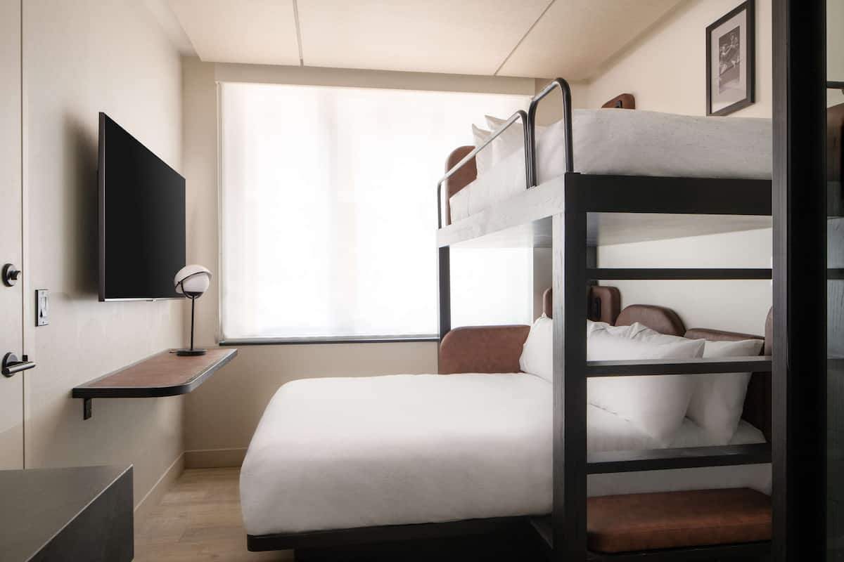Hypo-allergenic bedding, in-room safe, laptop workspace