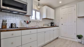 Fridge, microwave, coffee/tea maker, toaster