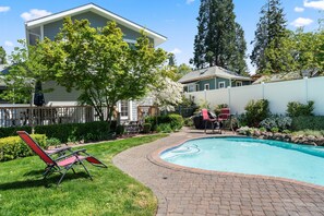 A heated pool, pool loungers
