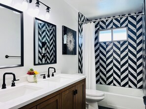 Hair dryer, towels, soap, shampoo