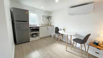 Fridge, microwave, toaster, cookware/dishes/utensils