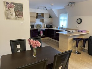 Fridge, microwave, oven, high chair