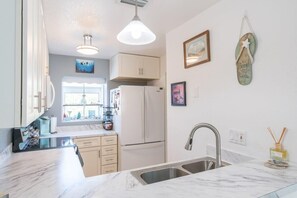 Fridge, microwave, oven, stovetop - Beachside Oasis at Villages of Seaport (Cape Canaveral)