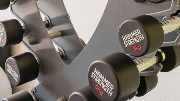A set of adjustable dumbbells with weight markings.