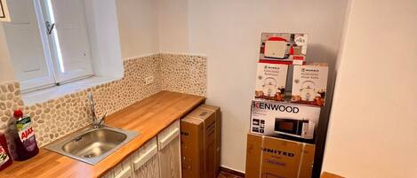 Mini-fridge, microwave, stovetop, electric kettle