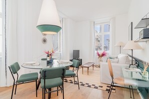 Superior Apartment | Living area | Flat-screen TV