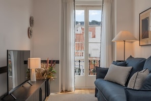 Standard-Apartment | Wohnbereich | Flachbildfernseher