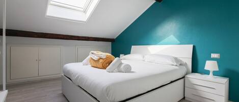 2 dormitorios, tabla de planchar con plancha, Internet y ropa de cama