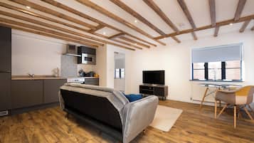 Business Apartment | Living area | 45-inch Smart TV with digital channels, TV, Netflix