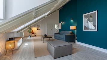 Superior Loft | Living area | Flat-screen TV
