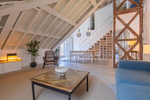 Superior Loft | Living area | Flat-screen TV