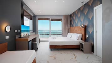 Junior Studio Suite, Sea View | Premium bedding, in-room safe, desk, free WiFi