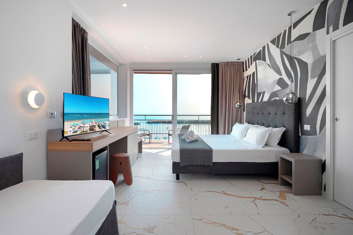 Chambre Quadruple Supérieure | Coffres-forts dans les chambres, Wi-Fi gratuit