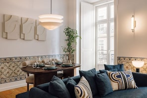 Signature Apartment | Living area | Flat-screen TV