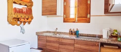 Fridge, microwave, stovetop, coffee/tea maker