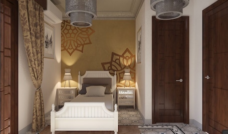 Colchones con pillow-top, minibar y caja de seguridad en la habitación