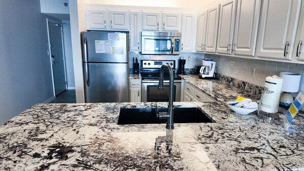 Top of the line stainless steel appliances and stylish upgrades entice the chef in you to get creative in this culinary paradise. - Beachfront 3BR Oasis w/Balcony Views, Pool Access (Orange Beach)