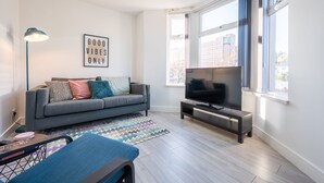 Apartamento City | Zona de estar