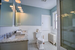 Bathtub, hair dryer, towels