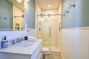 Bathtub, hair dryer, towels