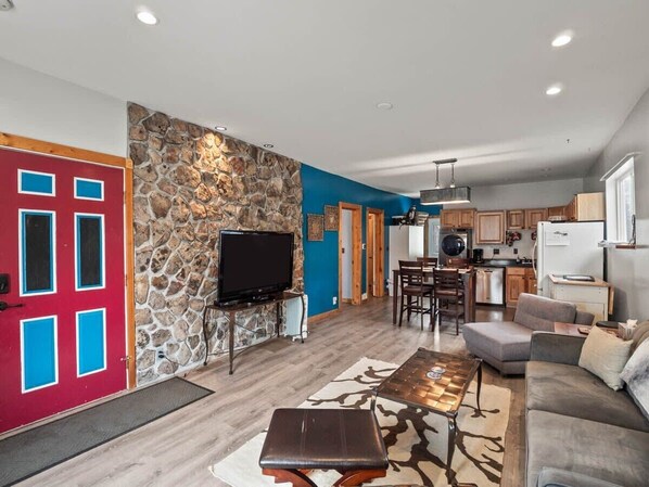 TV, fireplace, books, offices