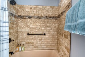 Bathtub, hair dryer, towels