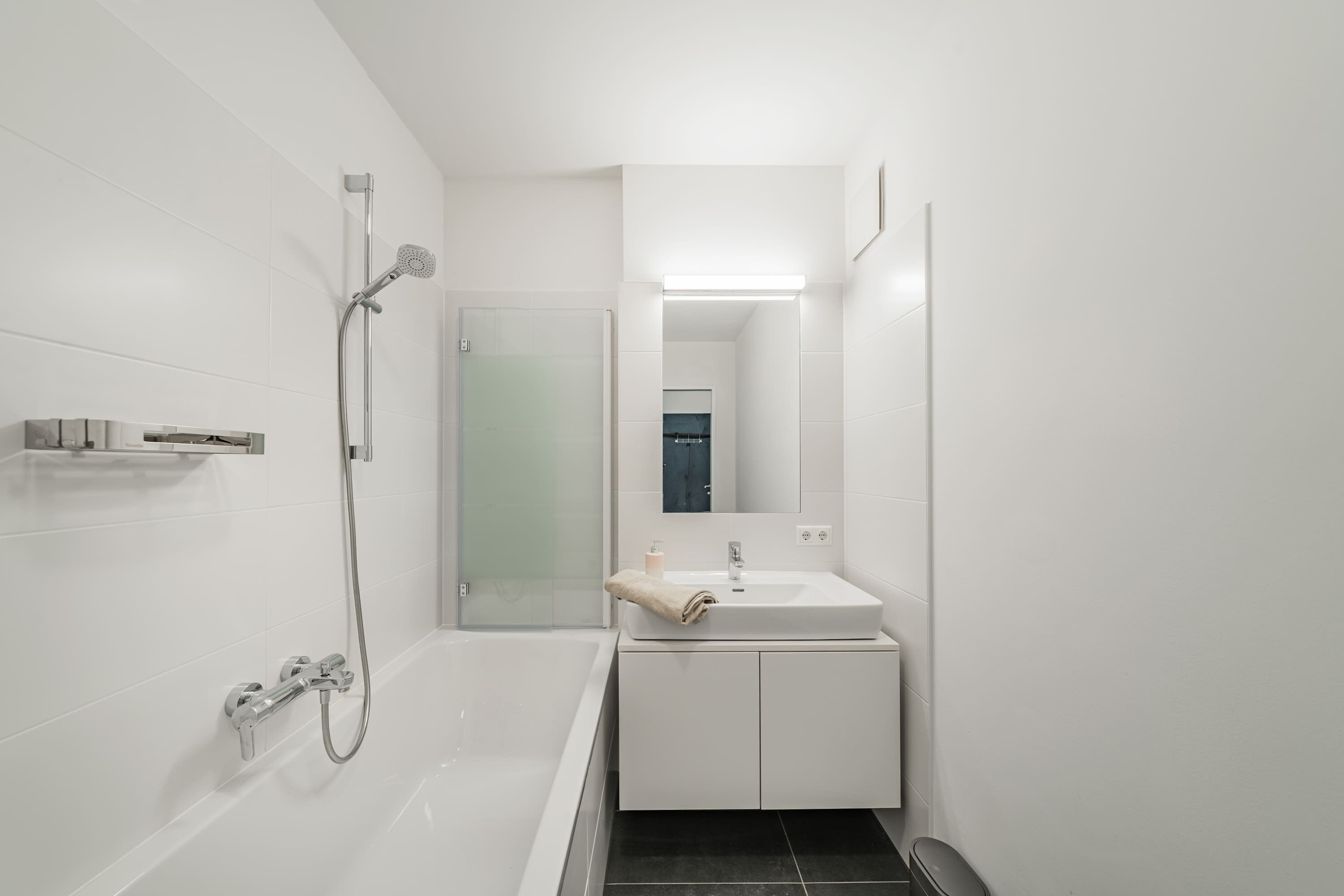 Bathtub, hair dryer, towels