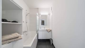 Shower, hair dryer, towels