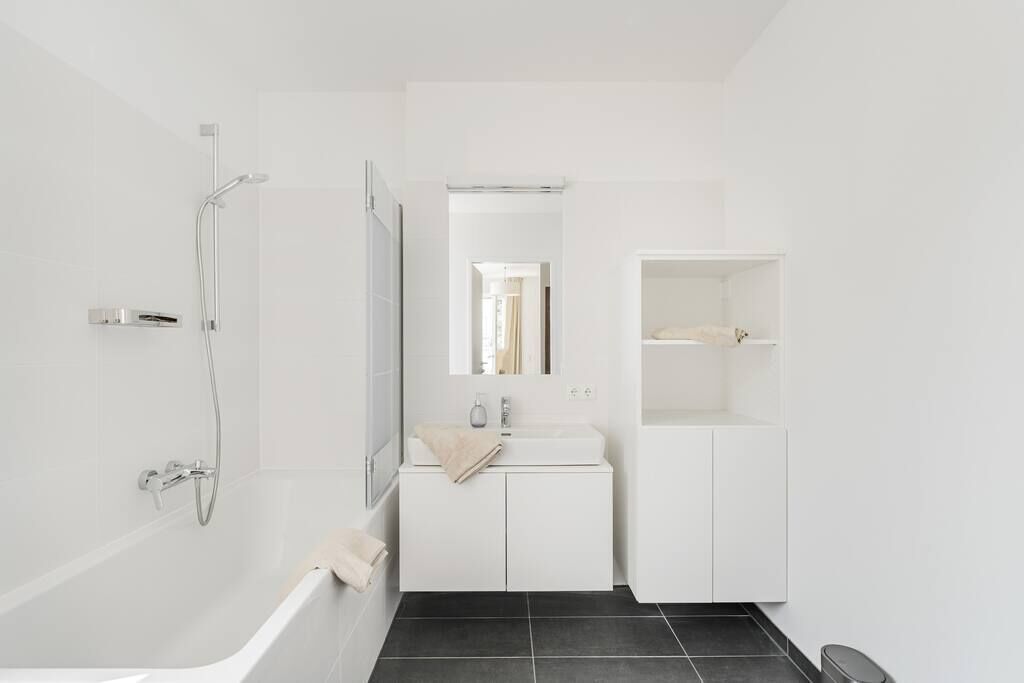 Bathtub, hair dryer, towels