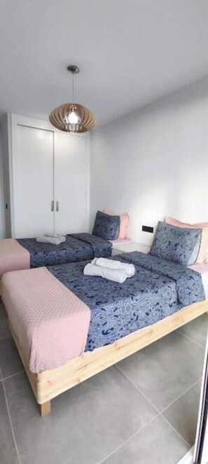 2 bedrooms, desk, iron/ironing board, travel cot