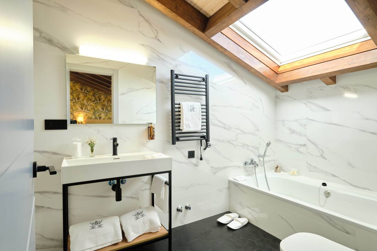 premium double room | bathroom | designer toiletries, hair dryer, slippers, towels