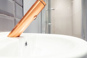 Hair dryer, towels, soap, shampoo