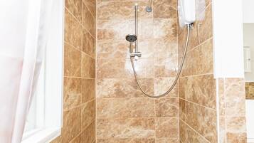 Hair dryer, towels, soap, shampoo