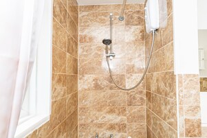 Hair dryer, towels, soap, shampoo