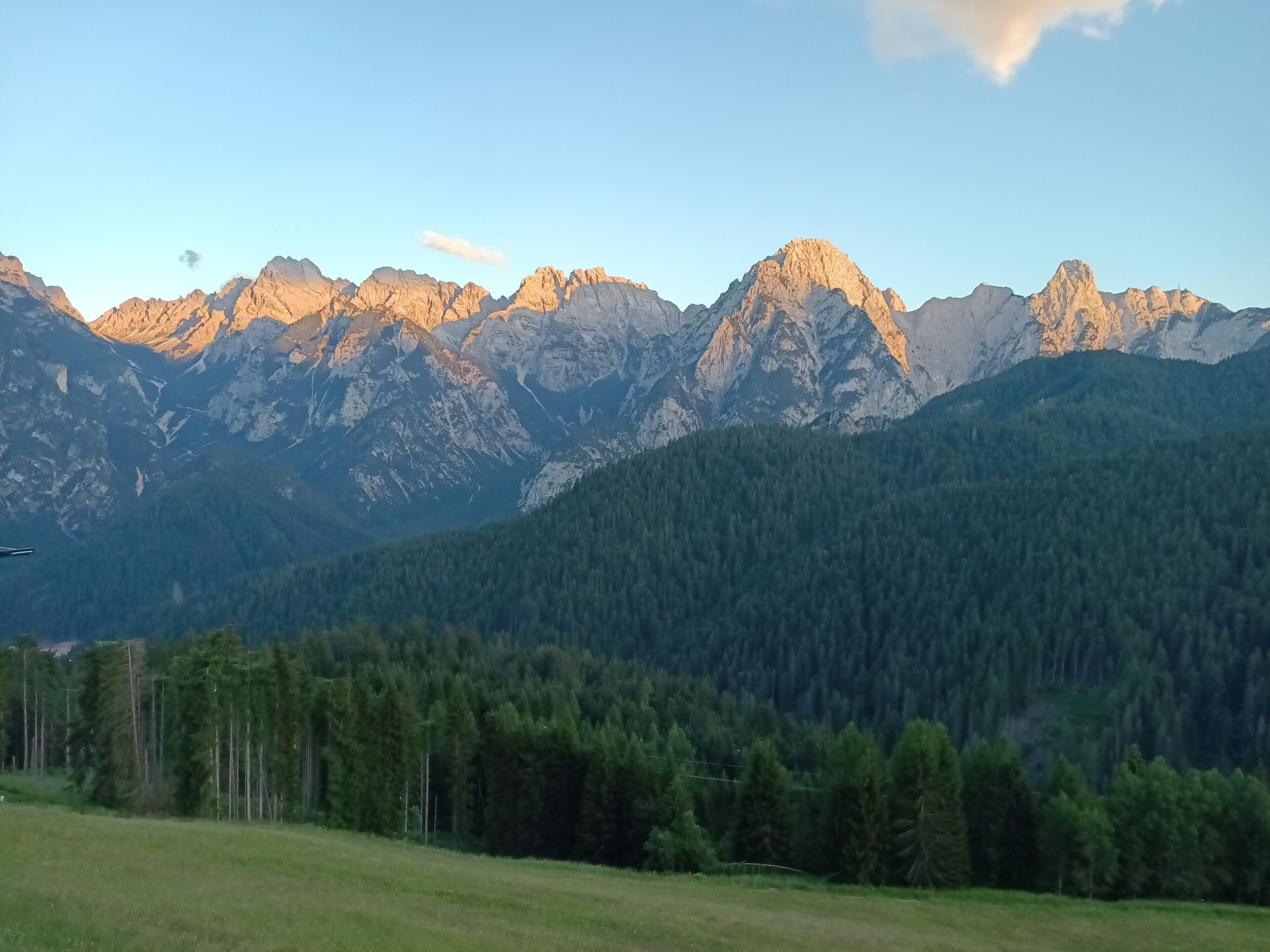 A mountainous landscape with a clear sky.