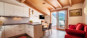 Appartement "Sagschneiderhof Red Delicious" avec vue sur les montagnes, jardin et Wi-Fi.