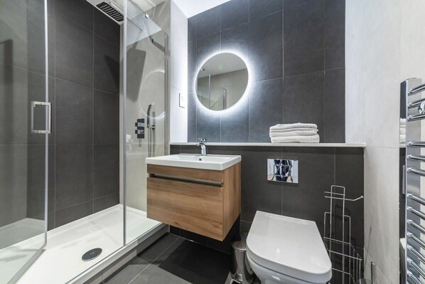 Shower, free toiletries, hair dryer, towels