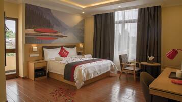 Executive-Zimmer | Daunenbettdecken, Minibar, Schreibtisch, kostenloses WLAN