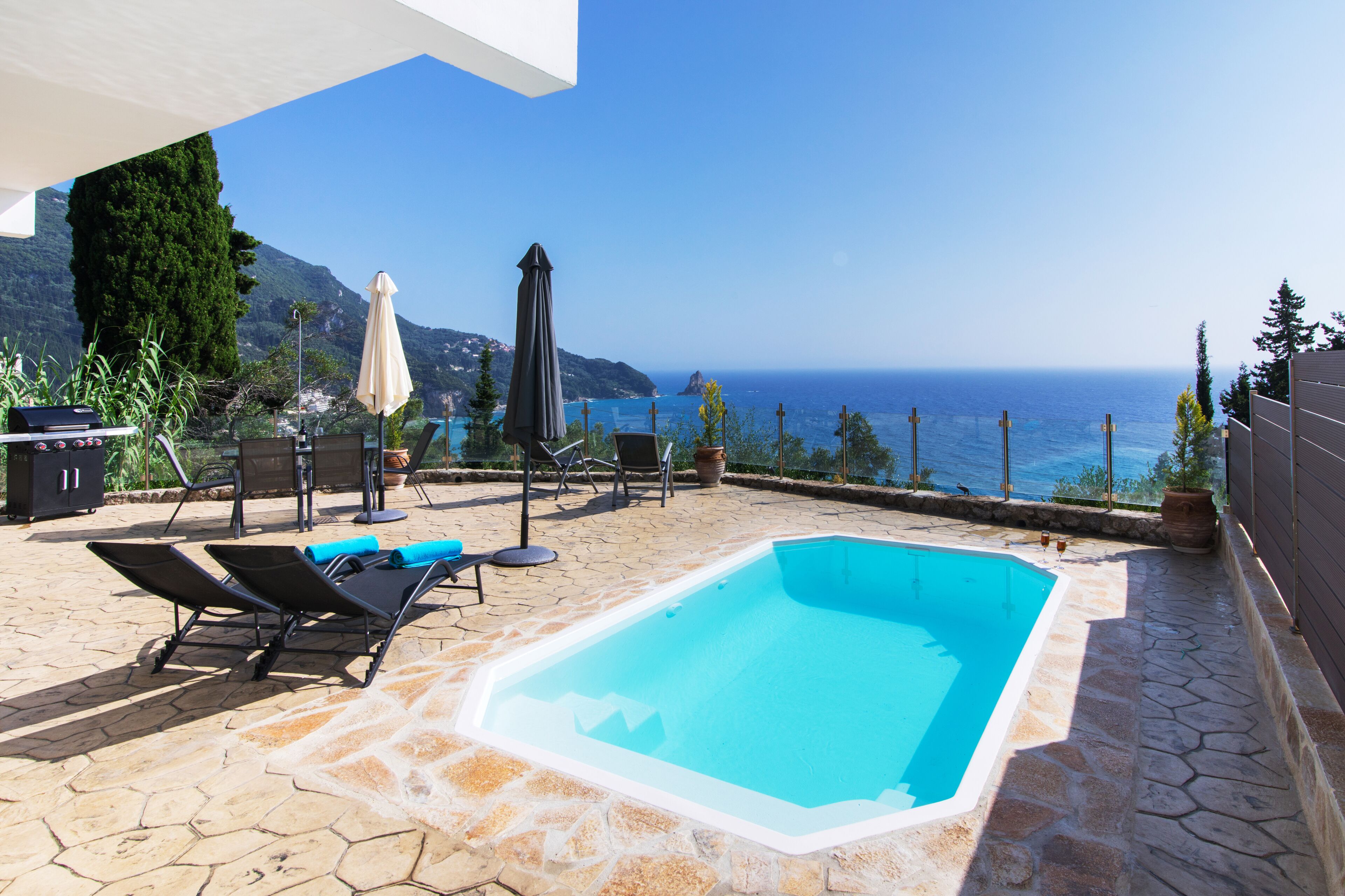 Seasonal outdoor pool, pool umbrellas, pool loungers