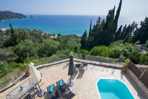 Seasonal outdoor pool, pool umbrellas, sun loungers