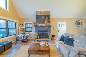 Smart TV, fireplace, books