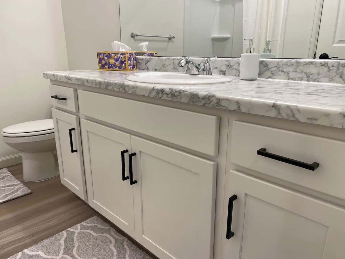 Bathtub, hair dryer, towels