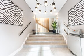 Interior entrance - ELEVEN Apartments Real de la Carretería, by Homing U (Seville)