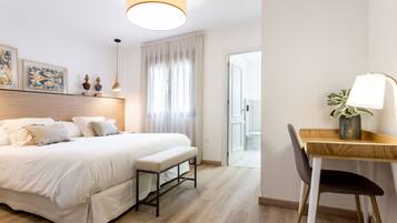 Premium Apartment | Premium bedding, down duvets, memory-foam beds, individually decorated