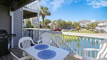 Casa de ciudad, varias camas (Barrier Dunes 125 - 49 Sand Dollar Sh) | Restaurante al aire libre