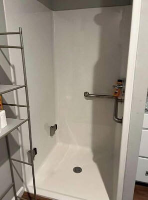 Shower, towels, soap, shampoo